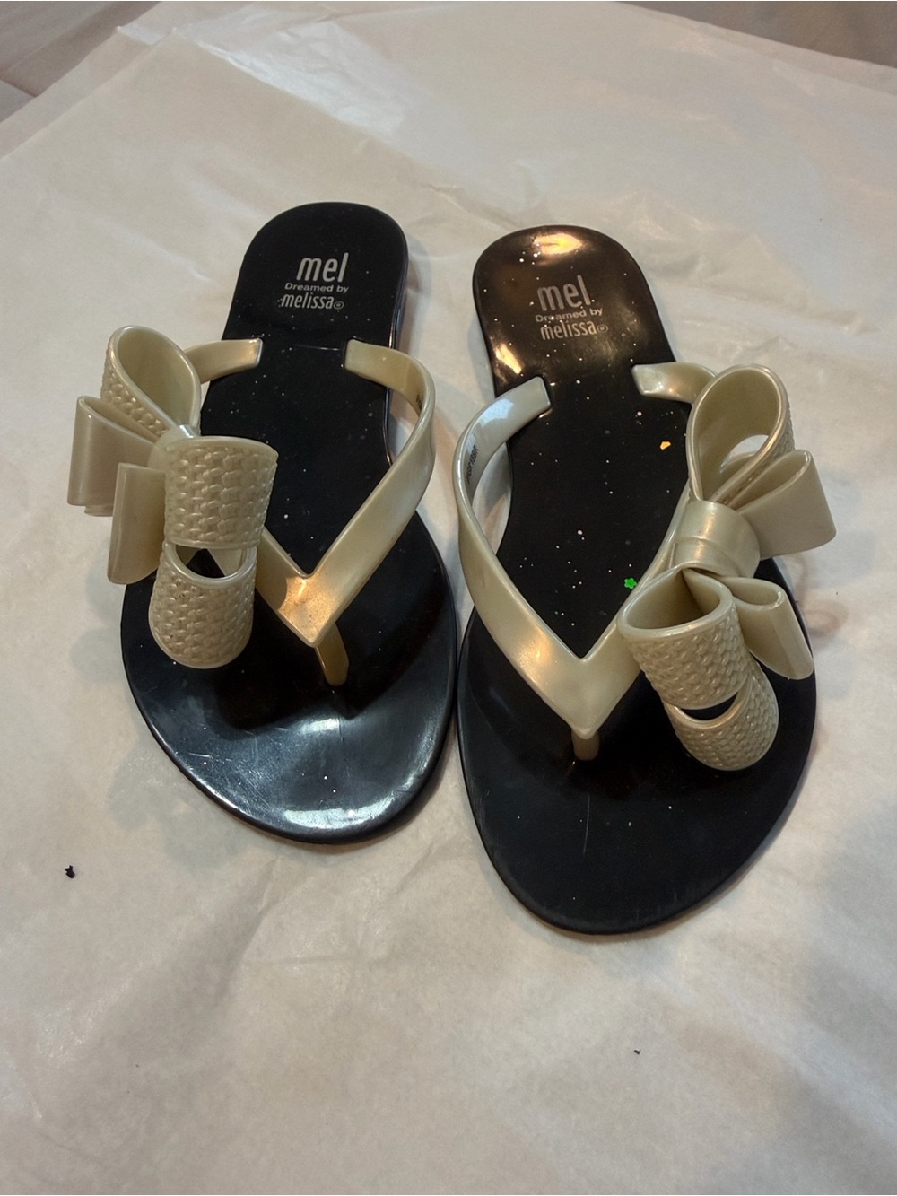 Mel by Melissa Black Footbed Cream Bow Flip Flop Sandals